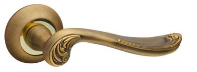 Door handles on rose ART R02 AB/GP-7
